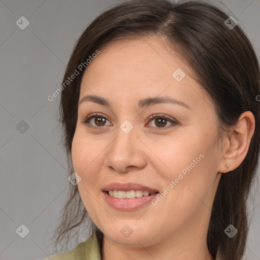 Joyful white young-adult female with medium  brown hair and brown eyes