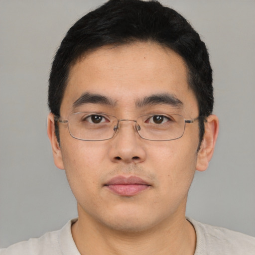 Neutral asian young-adult male with short  black hair and brown eyes