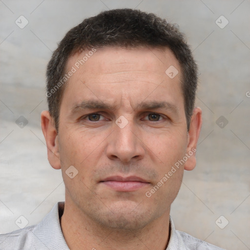 Neutral white adult male with short  brown hair and brown eyes