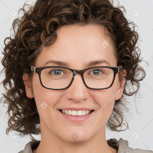 Joyful white young-adult female with medium  brown hair and green eyes