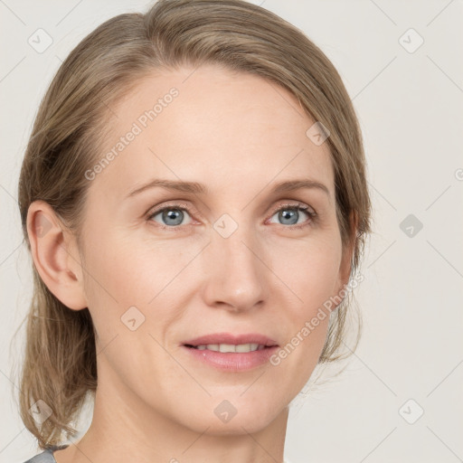 Joyful white young-adult female with medium  brown hair and blue eyes