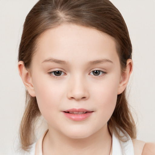 Joyful white child female with medium  brown hair and brown eyes