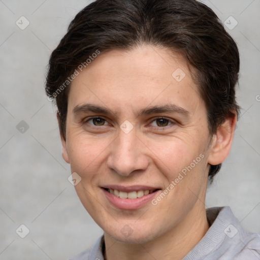 Joyful white adult female with medium  brown hair and brown eyes