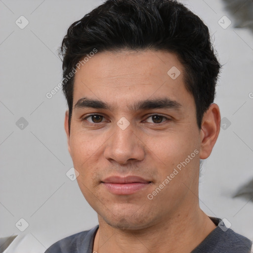 Joyful white young-adult male with short  black hair and brown eyes