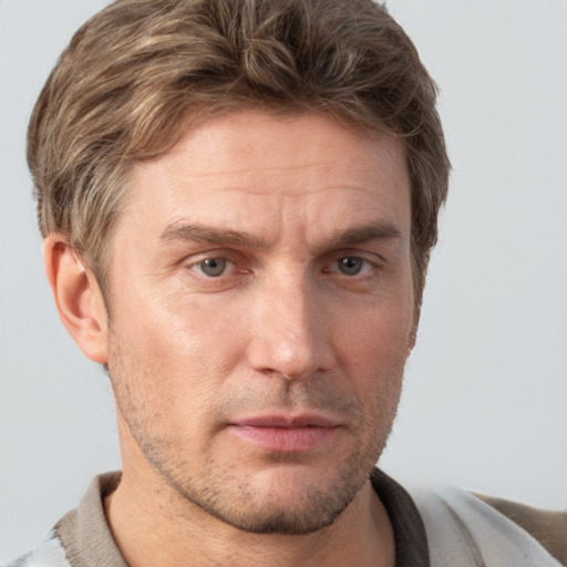 Neutral white adult male with short  brown hair and brown eyes