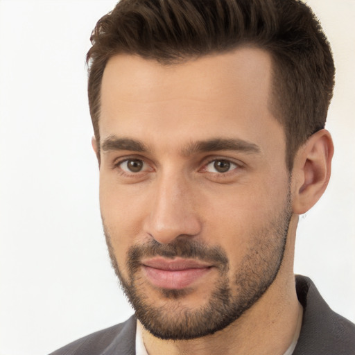 Joyful white young-adult male with short  brown hair and brown eyes