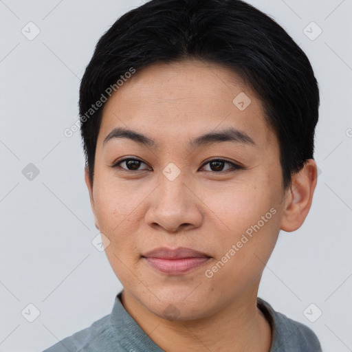 Joyful asian young-adult female with short  black hair and brown eyes