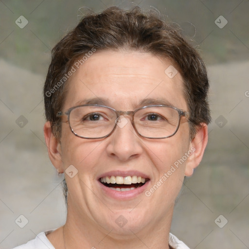 Joyful white adult male with medium  brown hair and brown eyes