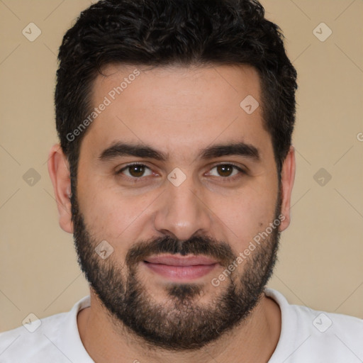 Joyful white young-adult male with short  black hair and brown eyes