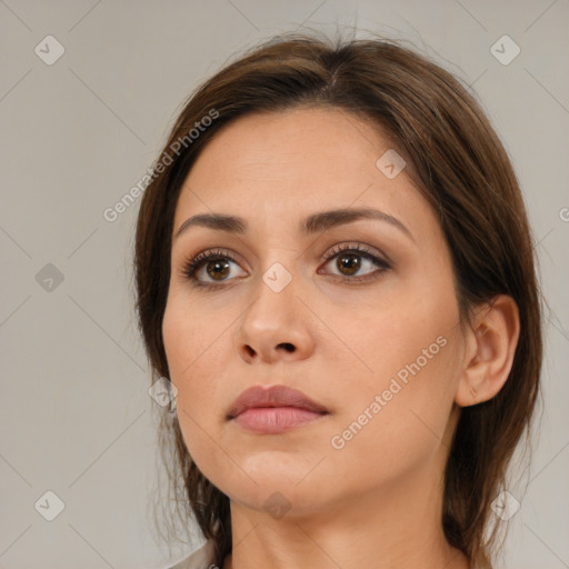 Neutral white young-adult female with medium  brown hair and brown eyes