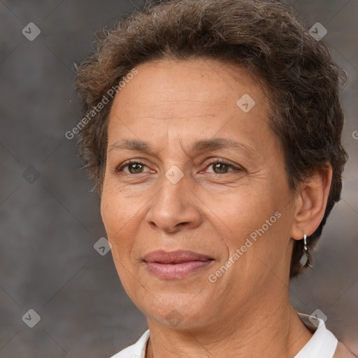 Joyful white adult female with short  brown hair and brown eyes