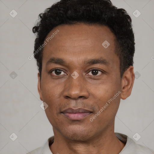 Neutral latino adult male with short  black hair and brown eyes