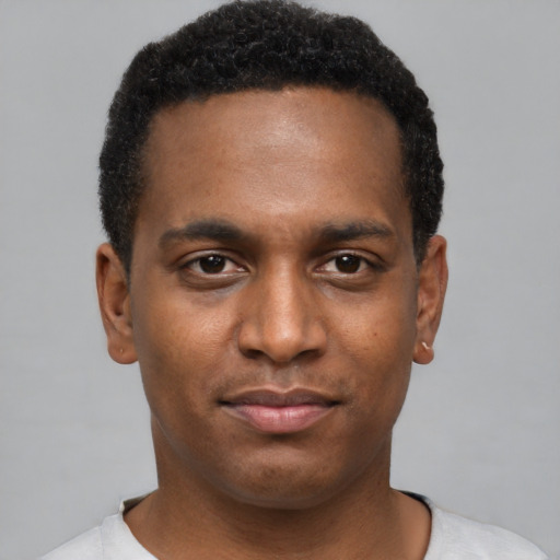 Neutral black young-adult male with short  black hair and brown eyes