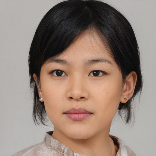 Neutral asian young-adult female with medium  black hair and brown eyes