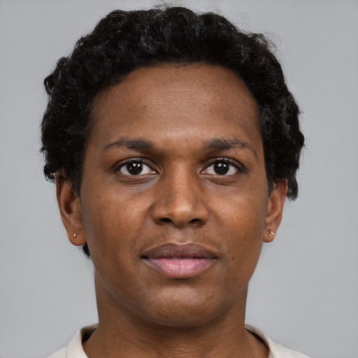 Neutral black adult male with short  brown hair and brown eyes