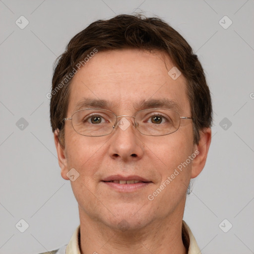 Joyful white adult male with short  brown hair and grey eyes