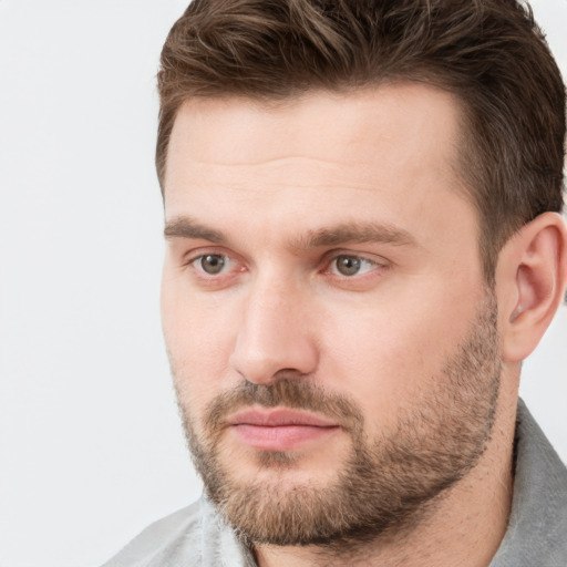 Neutral white young-adult male with short  brown hair and brown eyes