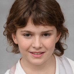 Joyful white child female with medium  brown hair and brown eyes