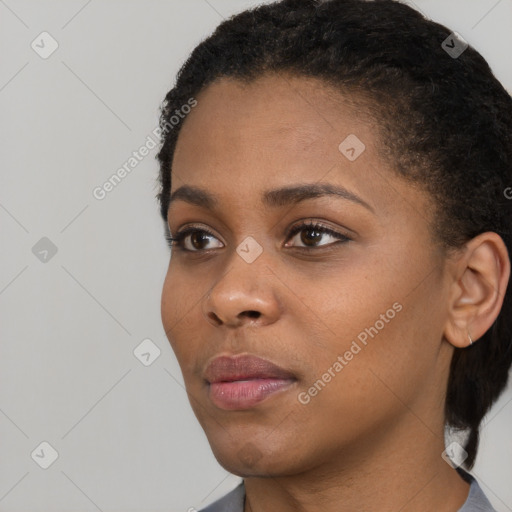 Neutral black young-adult female with short  black hair and brown eyes