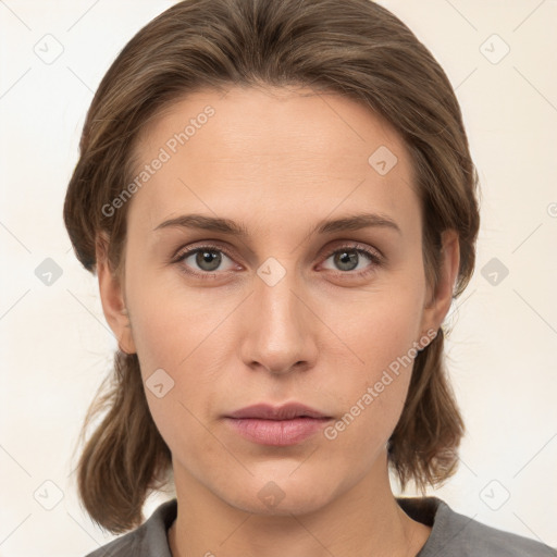 Neutral white young-adult female with medium  brown hair and grey eyes