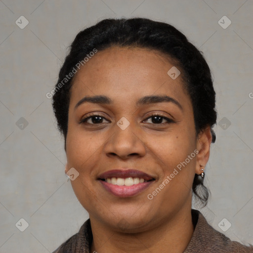 Joyful latino young-adult female with short  black hair and brown eyes