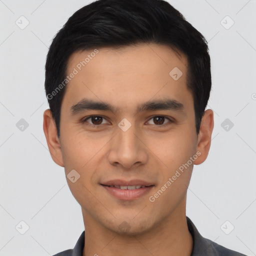 Joyful latino young-adult male with short  black hair and brown eyes