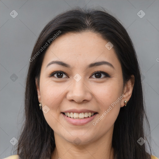 Joyful white young-adult female with long  brown hair and brown eyes