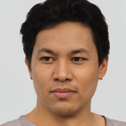 Neutral asian young-adult male with short  brown hair and brown eyes