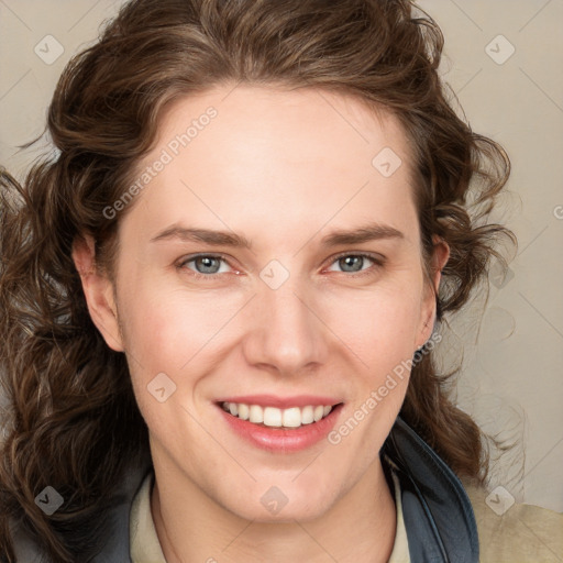 Joyful white young-adult female with medium  brown hair and blue eyes