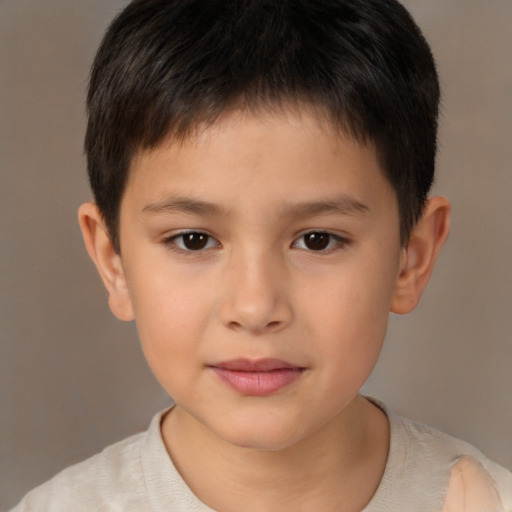 Joyful white child male with short  brown hair and brown eyes