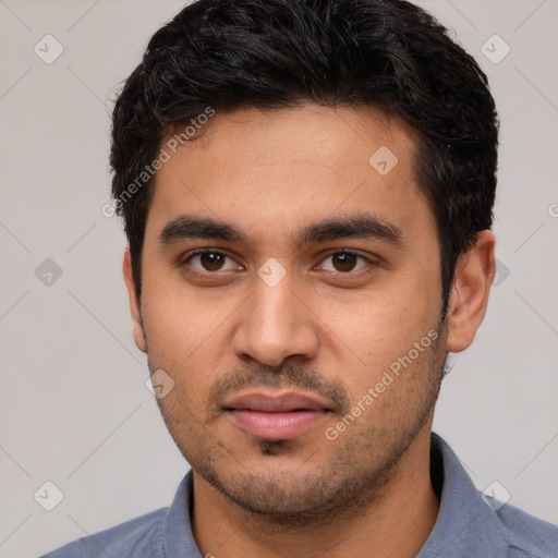 Neutral white young-adult male with short  black hair and brown eyes