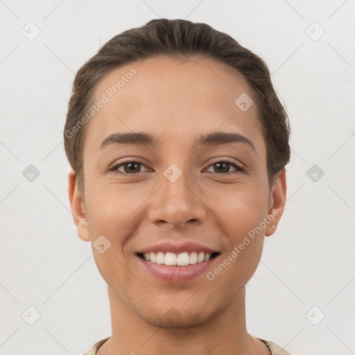 Joyful white young-adult female with short  brown hair and brown eyes