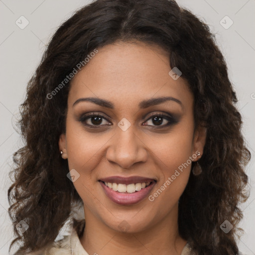 Joyful black young-adult female with long  brown hair and brown eyes