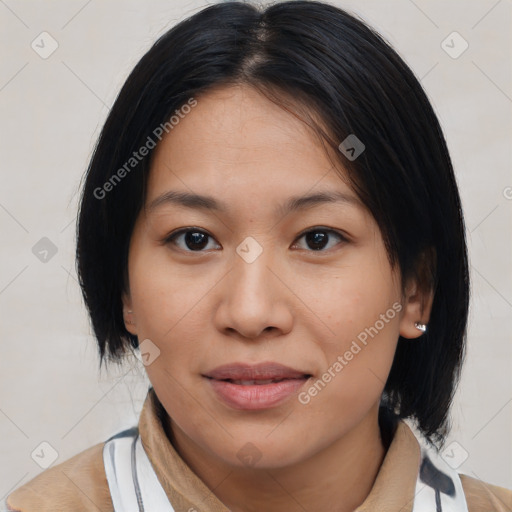 Joyful asian young-adult female with medium  black hair and brown eyes