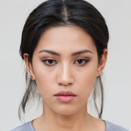 Neutral asian young-adult female with medium  black hair and brown eyes