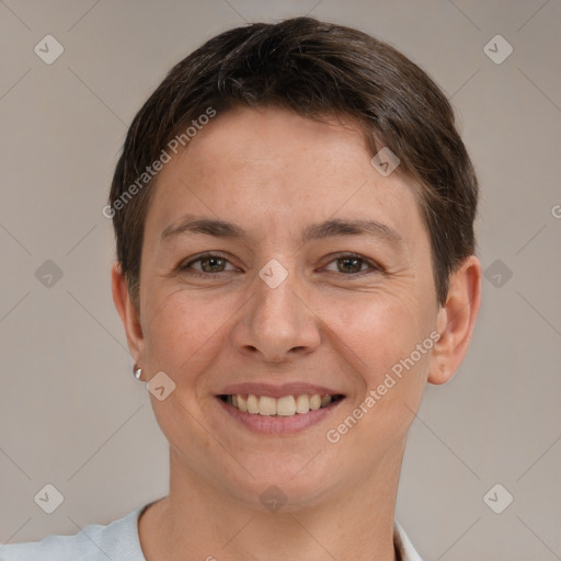 Joyful white adult female with short  brown hair and brown eyes