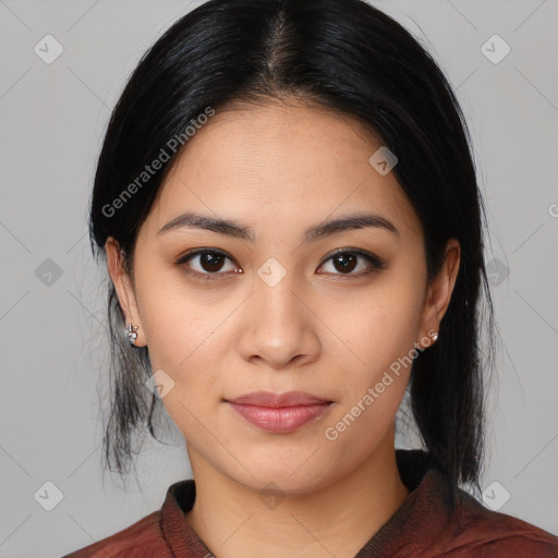 Joyful latino young-adult female with medium  black hair and brown eyes