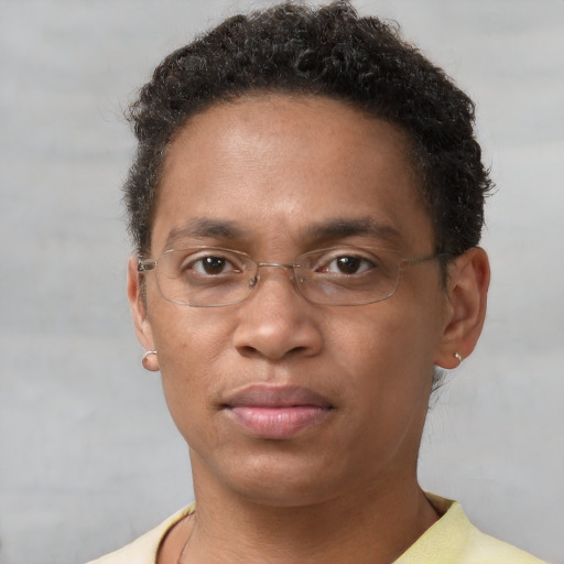Neutral black adult male with short  brown hair and brown eyes
