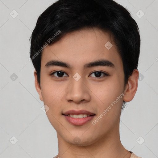 Joyful asian young-adult male with short  black hair and brown eyes