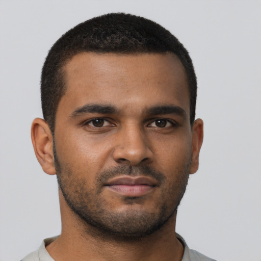 Neutral black young-adult male with short  brown hair and brown eyes