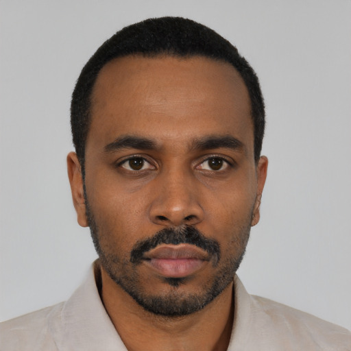 Neutral black young-adult male with short  black hair and brown eyes