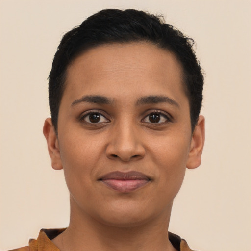 Joyful latino young-adult female with short  brown hair and brown eyes