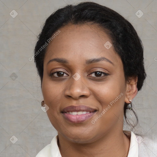 Joyful black young-adult female with medium  black hair and brown eyes