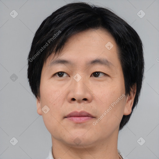 Neutral asian young-adult male with short  black hair and brown eyes