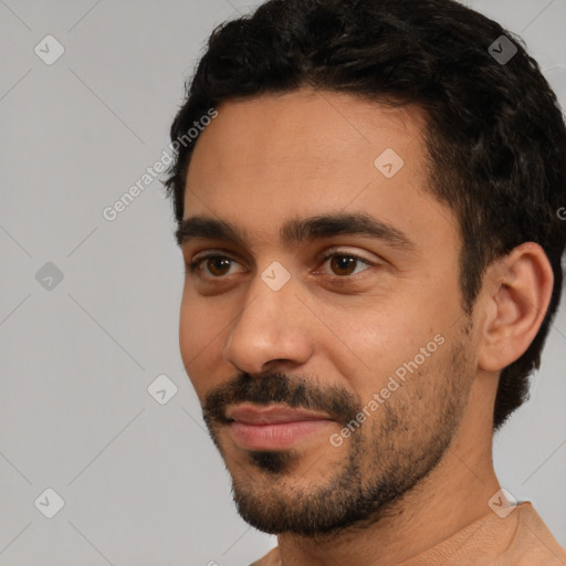 Neutral latino young-adult male with short  black hair and brown eyes