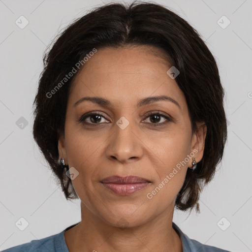 Joyful white adult female with medium  brown hair and brown eyes