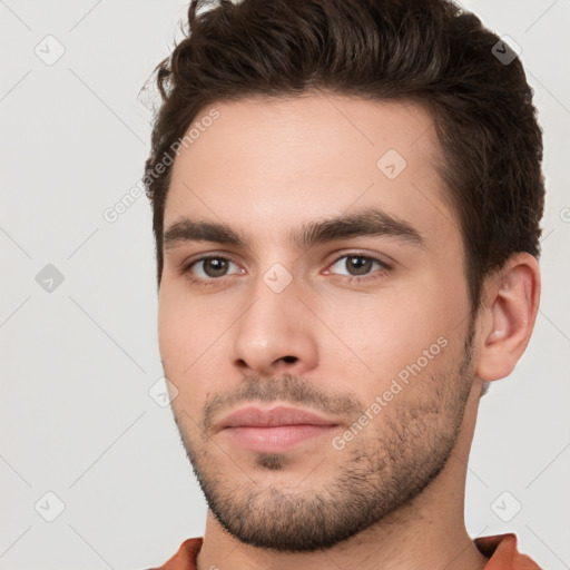 Neutral white young-adult male with short  brown hair and brown eyes