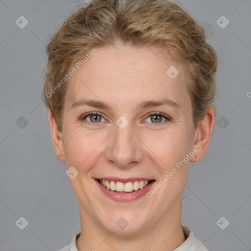 Joyful white adult female with short  brown hair and brown eyes