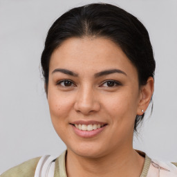 Joyful asian young-adult female with short  brown hair and brown eyes