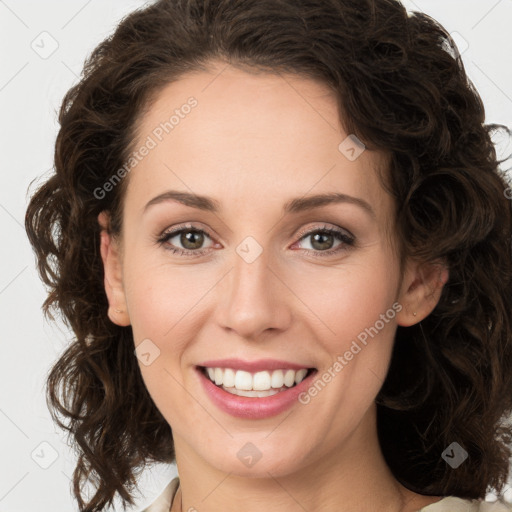 Joyful white young-adult female with medium  brown hair and green eyes